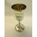 A silver trophy cup presented by the Lytham Yacht Club 1900, of chalice form, makers mark rubbed,