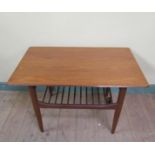 A G Plan Danish design teak low table with spindled magazine rack with original labels, the table