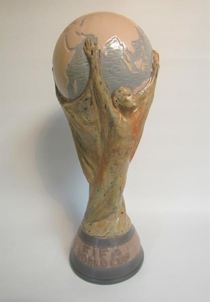 A Lladro porcelain 1978 Sport Billy, Fifi world Cup Trophy, 35cm h.