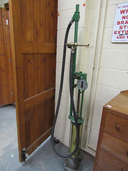 A Gilbert & Barker Manufacturing Co spring filled Massachusetts hand cranked petrol pump, 200cm h.