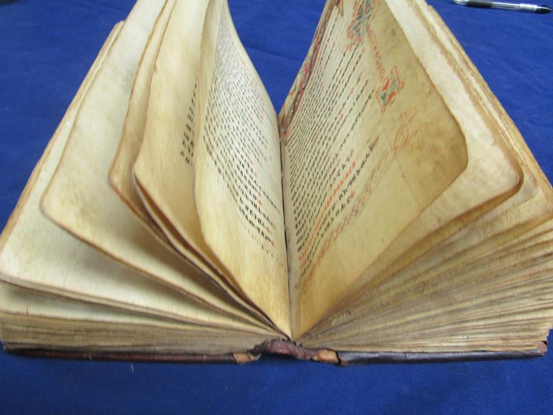 A Book - An Antique Ethiopian Bible, hand written on velum, the pages hand stitched to spine with - Image 5 of 9