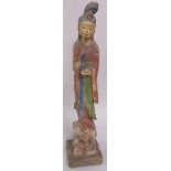 A late 18c/early 19c Chinese carved polychrome figure of a lady carrying a jar, 62cm h.