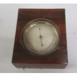 A 19c aneriod barometer in brass case with ring pull handle, the silvered face named E J Dent, Paris