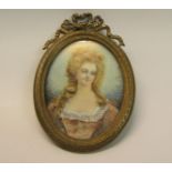 R Cauier - 19c oval portrait miniature of a lady, on ivory, brass framed, 7cm x 5.5cm.
