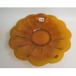An 18c/19c Chinese Beijing amber glass floraform lobed dish, 31cm diam.