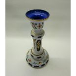 A Bohemian glass candlestick white cut to blue hand decorated with flowers, 20cm h.