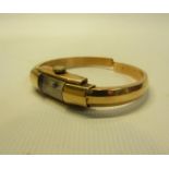 An 18k Gold ladies bracelet watch with narrow rectangular dial
