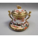 A Spode two handled loving cup, cover and stand, the cup with gilt caryatid handles, the cover