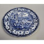 A blue and white plate transfer printed with the 'Philosopher' pattern, 25.5cm diam.