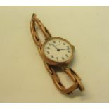 A 9ct Gold vintage ladies watch on 9ct gold stretch bracelet strap