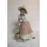 A Lladro porcelain figurine - A Step In Time, model no.5158, 22cm h.