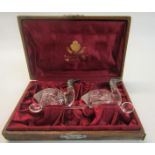 A pair of late 19c French cut and moulded glass table salts in the form of ducks with silver heads