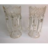 A pair of 19c cut clear glass table lustres with prismatic drops and gilt highlight decoration to