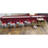 A W Brittain coronation coach with king and queen figures, no.1470, in original box, 51cm l.