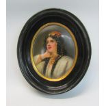 An oval framed portrait miniature of a Spanish lady, framed, 6.5cm x 8cm.