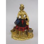 A 19c French gilt bronze novelty desk stand in the form of a lady, the removable head a seal