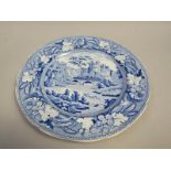 A blue and white semi china plate printed with 'Italian Ruins' pattern, 25.5cm diam.