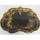 A 19c Jennens & Bettridge patent papier mache tray of serpentine form, black lacquered with a raised