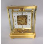 A Jaeger Le Coultre Atmos Swiss made four glass mantel clock, 21cm w, 23.5cm h.