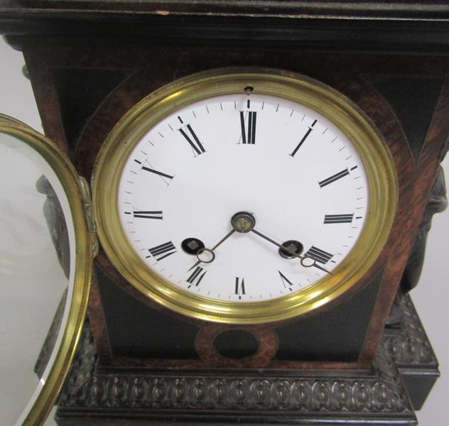 A 19c ebonised mantel clock with figurative pilaster mounts, burr wood crossbanding and inlaid - Image 3 of 3