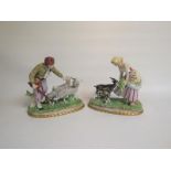 A pair of Sitzendorf porcelain figure groups of goat herders, crowned S marks to base, 16.5cm & 17cm