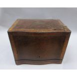 A Victorian tantalus box with rising folding cover, opening to reveal a lift out tantalus frame