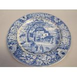A blue and white plate transfer printed with the 'Eastern Street Scene' pattern, slightly a/f, 25.