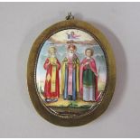 A 19c Continental ceramic icon of slightly domed oval form, depicting three religious figures and