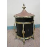 A late 19c Art Nouveau brass fuel bin of cylindrical form with an embossed circular domed cover with