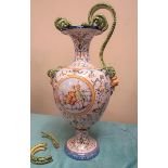 A large Italian Mollica Majolica two handled pedestal baluster vase, hand decorated in Renaissance