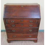 A mid 18c fruitwood bureau with fall front and fitted interior with central cupboard flanked by