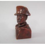 A French carved wooden sculpture of Napoleon, inscribed 'Charles Dessertine', 10cm h.