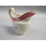 A late 18c New Hall ovoid milk jug with pink trellised decoration and flower painting, pattern no.