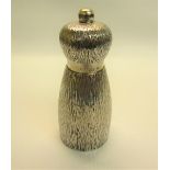A Gerald Benney pepper mill with a grained body, makers mark AGB for Gerald Benney, London 1971,