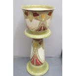 A Mintons Secessionists Art Nouveau period transfer printed jardiniere on stand, in stylist floral