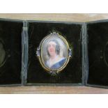 Unsigned 19c oval miniature portrait of a lady on ivory, framed and glazed, in a brass and enamel