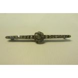 An 18ct gold diamond set brooch, approx 2.4ct.