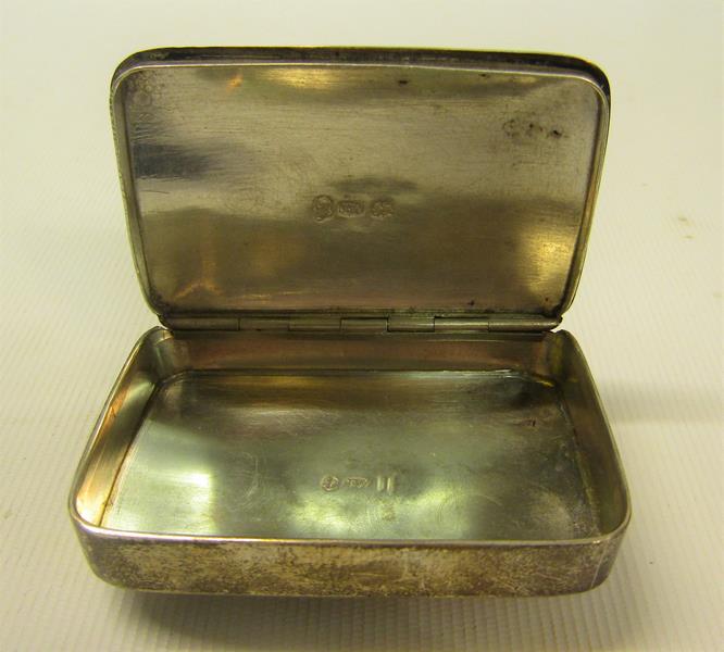 A late Georgian silver snuff box of plain rectangular form with a slightly domed hinged cover, - Image 2 of 3