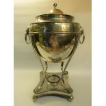A late Georgian silver tea urn of ovoid form with a dome lift off cover and side carrying handles