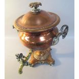 A William IV copper and brass two handled two urn of rococo form with turn on/turn off tap,