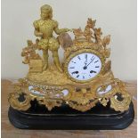 A mid 19c French figural mantel clock. in gilt spelter case with inset white alabaster panels. The