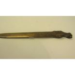 A late 19c/early 20c cast brass paper knife with a harnessed horse head terminal, 22cm l.