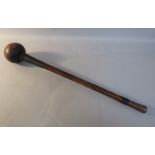 A late 19c/early 20c Zulu carved wood throwing club with ball terminal, the handle wire bound in two