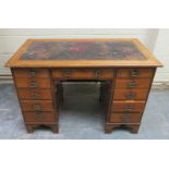 A Victorian mahogany pedestal desk of rectangular form with moulded edge, having leather insert (
