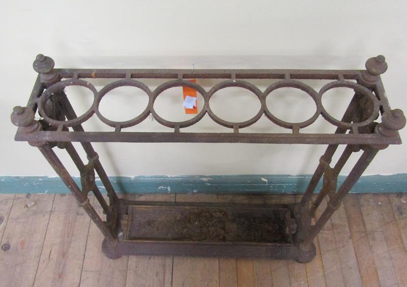 A Victorian cast iron stick stand with trough and six ring divisions, 62cm w, 62cm h. - Image 2 of 3