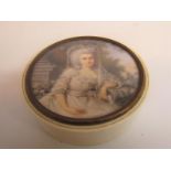 A 19c ivory box of circular form with a lift off cover, which has a miniature painting of a lady