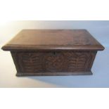 An early 18c oak coffer box of rectangular form, the hinged cover with moulded edge, the box face