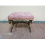 A 19c carved giltwood X framed stool with upholstered seat, 60cm l.