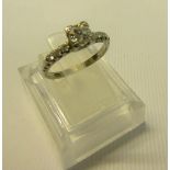 A platinum and diamond solitaire set ring, approx 0.65ct, size Q.