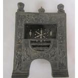 A Victorian cast iron miniature fire place decorated with classical figures, 14.5cm w, 20cm h.